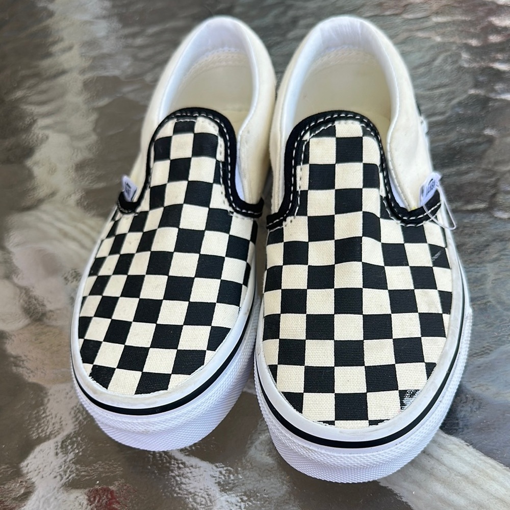 Vans Black and White Classic Slip-On Sneakers